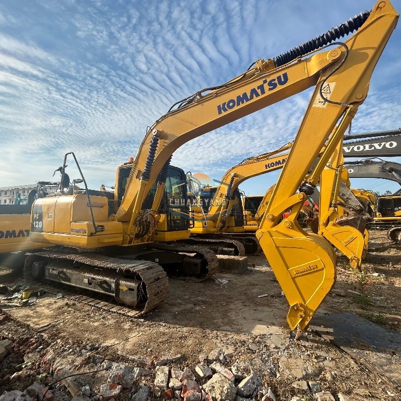 Pelle rétrocaveuse hydraulique sur chenilles Komatsu PC120 d'occasion à vendre - Prix abordable
